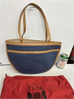 Tusk leather handbag with storage bag
