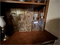 LOT OF FIVE GLASS DECANTERS