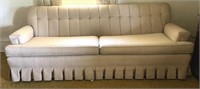 84” MCM Sofa on casters, in good condition, no
