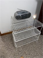 Sony CD player and two stacking wire shoe racks