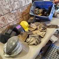 pitted Welding Helmets, nail apron, hard hats,