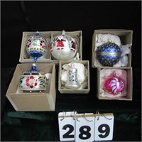 Large decorated Christmas ornaments.