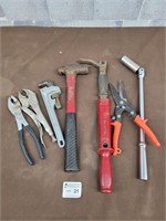 Plyers, pipe wrench, nail puller, hammer etc