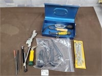 Tool box, allen keys, wrenches, tire gauges