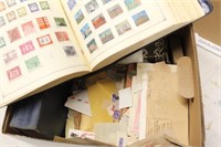 Worldwide stamps remainders in box incl 2 albums