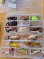 Vintage fishing lures with other fishing items