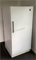 GE brand upright freezer in working order - no