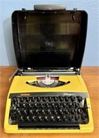 Yellow Vintage Brother Charger 11 Typewriter