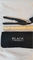 Black mini flat iron.