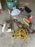 Misc chain, tote extension cords, lawn sprinkler,