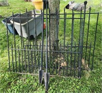Two 4ft wrought iron gate pieces and stakes