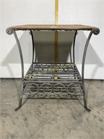 Burnished metal patio end table w/ wicker top