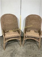 Pair of dark wicker patio chairs