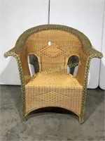 Wicker chair w/ green border & diamond pattern