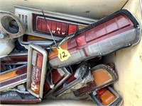 BOX OF EARLY TOYOTA TAIL LIGHTS