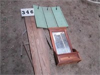 Mirrored shelf, wood ironing board, wood shutter