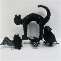 Halloween decorations. Black cat. Black bird with