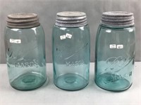 3 blue ball mason jars with bubbles