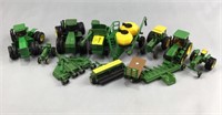 Assortment of model John Deer farming equipment