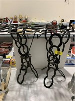 PAIR OF CAST IRON HORSESHOE END TABLES