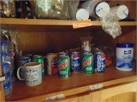 CABINET 3: PITCHERS, ADVERTISING SODA CANS AND