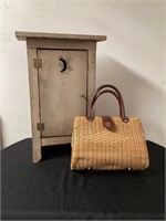 outhouse décor and vintage wicker purse