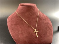 14 kt Gold cross pendant 1.17 grams weight with a