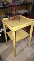Antique yellow side table with shelf below 28 x
