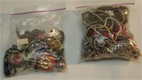 (2) BAGS COSTUME JEWELRY-PINS-EARRINGS-NECKLACES.
