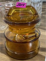 Amber glass barrel style lidded jar 5in