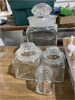 Group of glass canister kitchen jars