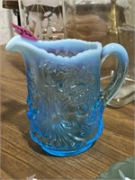 Blue into creamy blue glass pourer 4-5in