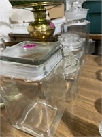 Group of glass canister candy jars