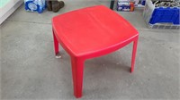 Small Red Plastic Display Table