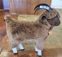 PLUSH AND WOODEN GOAT FIGURE