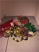 branded Mardi Gras beads