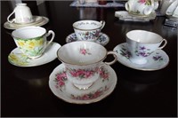 Lot of Four Cups and Saucers
