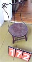 child’s chair w/wrought iron back