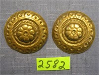 Pair of early punched brass clip on earrings