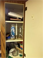 Cabinet - oil, lighters, coffee filters, candles,