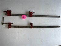 (2) Mismatched Small Pipe Clamps