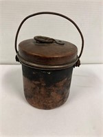 Small copper pot.