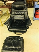 black recliner and stool