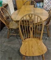 Table with leaf, and four chairs
Table is 42"