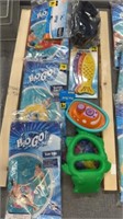 Swim rings, goggles, and toys
