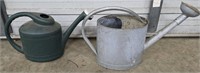 Plastic and metal watering cans