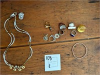 Rings and double layered necklace