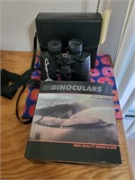 2 Sets Of Binoculars