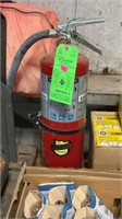 Fire extinguisher in the green