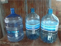 Three Plastic Water Jugs
